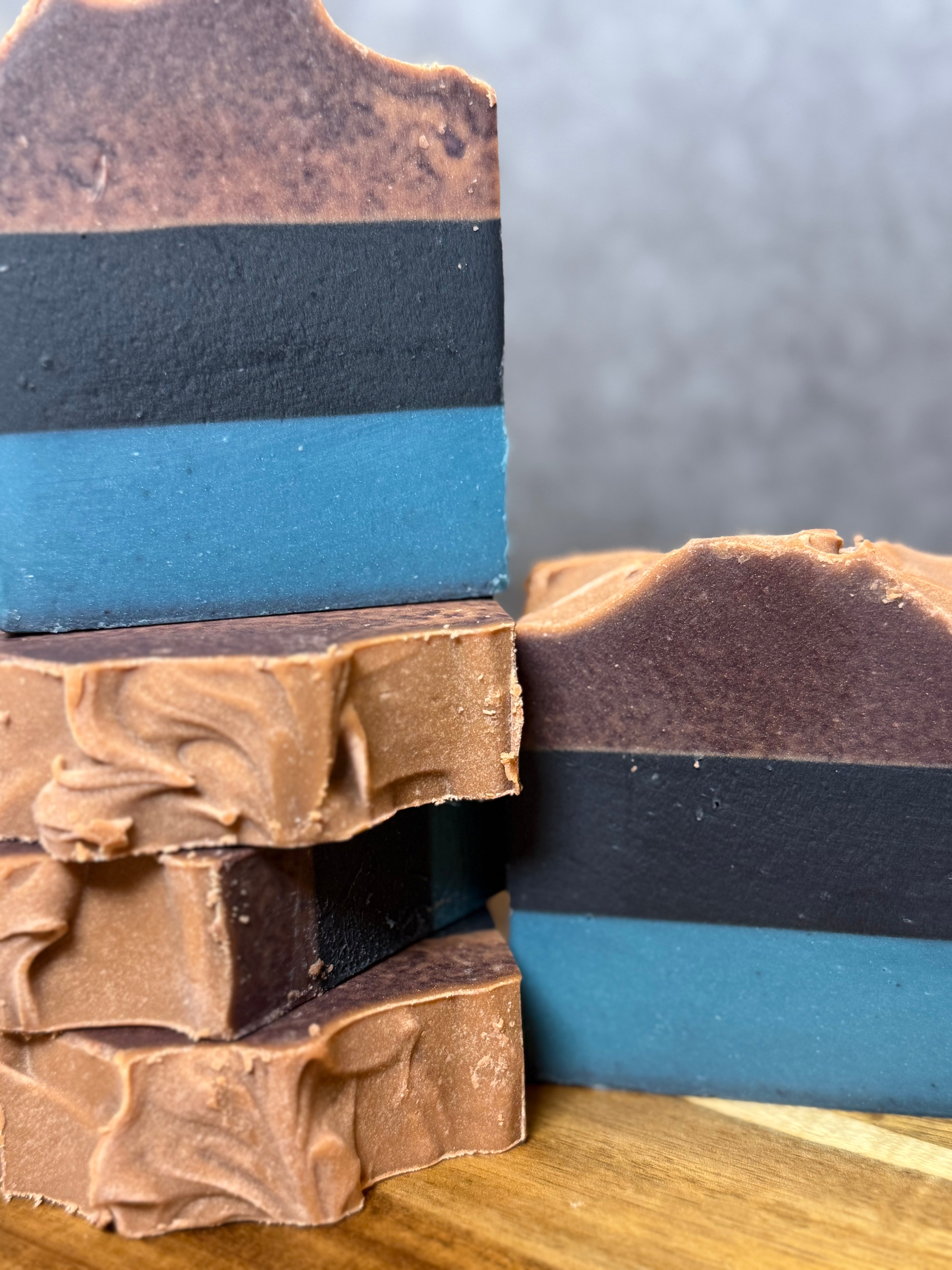 Layered tallow soap with activated charcoal